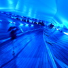 jogger at blue corridor