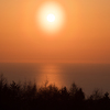 霞む夕日