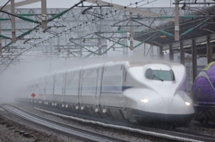 雨を切り裂いて